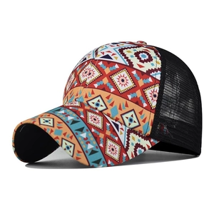 Close-up of colorful geometric tribal print and breathable black mesh on the trucker hat