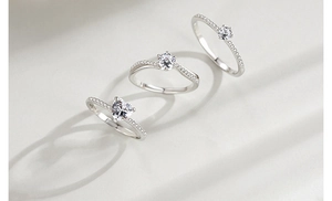 Detailed macro view of S925 sterling silver rings with heart and round zircon stones