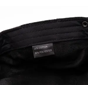 Care label showing material composition of 20% cotton and 80% polyester inside the cap