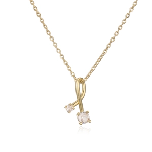 Gold-plated cross chain necklace with ribbon bow pendant and cubic zirconia stones