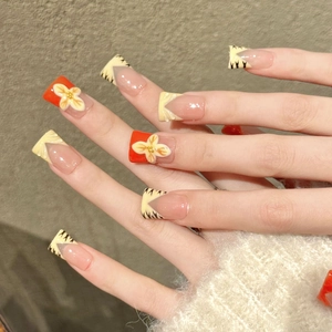 Tiger print press-on nails with 3D floral relief in pink and orange vintage style