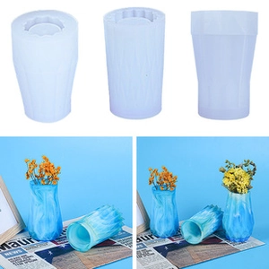 Three geometric textured silicone vase molds with blue resin finished products
