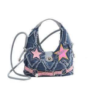 Blue denim Y2K crossbody bag with pink star patches and distressed fringe details