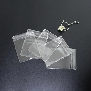 Detailed view of 5 transparent PVC jewelry bags with self-sealing closure for earrings