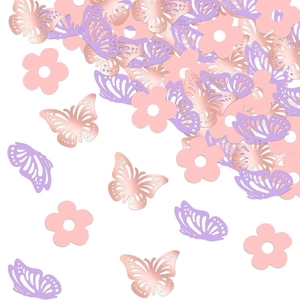 Pink and lavender butterfly flower confetti for party decorations on white background
