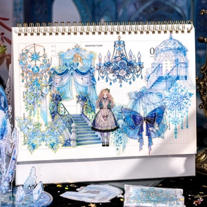 Blue floral PET stickers with gold foil details used for monthly planner decoration