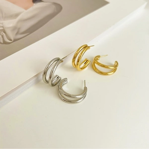 Minimalist double-layered C-shaped stud earrings in gold and silver stainless steel