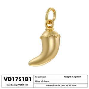 Detail of gold brass chili pepper pendant VD1751B1, 18.5mm length with polished finish