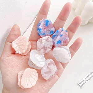 Pack of 8 colorful acetate hair clips in ocean shell shapes for women and girls