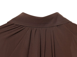 Detail of high-quality brown pleated midi dress collar and textured fabric craftsmanship
