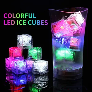 Luminous LED ice cubes with colorful glow for drinks in bar and wedding party decor