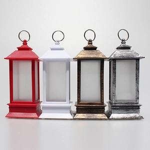 Detail of LED Christmas lanterns in red, white, antique gold, and silver finishes