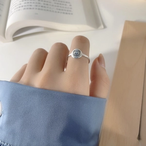 Minimalist S925 sterling silver cartoon bear ring with a polished round metal disc