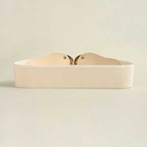 Detail of beige elastic waist belt featuring a gold metal clasp and floral texture