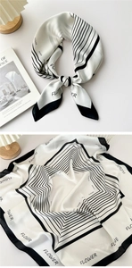 Detail showing high-quality silk-like satin texture and elegant FLOWER letter print