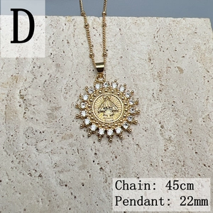 Macro view of 22mm Virgin Mary pendant with cubic zirconia and 45cm gold chain
