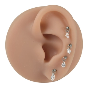 Set of four G23 titanium labret studs with clear zircon heart and star pendants on ear model
