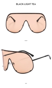 Front and side views of oversized tea lenses sunglasses with black metal frame and rivets