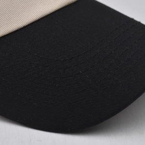 Detail of color-block cotton baseball cap with twill texture and 5-row brim stitching
