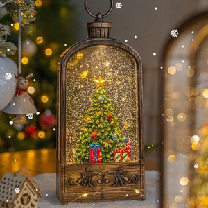Vintage bronze Christmas snow globe lantern with Christmas tree and shimmering glitter