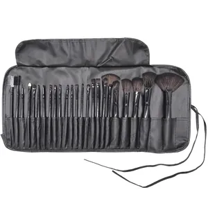 Professional 24-piece makeup brush set with wooden handles and black vegan leather storage bag