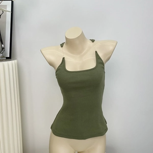 Close-up of military green ribbed tank top with transparent invisible shoulder straps