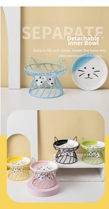 Detail view of separate ceramic cat bowl with decorative iron stand and ear design