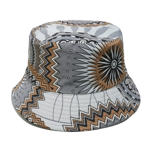 Detailed close-up of bohemian bucket hat showing geometric patterns and canvas texture