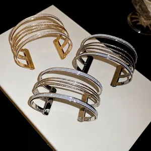 Minimalist multi-layer open cuff bracelet set with frosted glitter finish in three colors