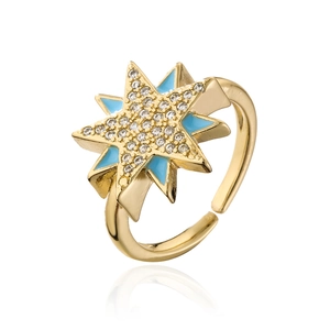 Close-up of 18K gold plated octagonal star ring with blue enamel and white zircon crystals