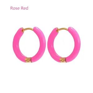 Close-up of 12mm rose red enamel hoop earrings in polished gold-plated finish