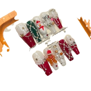Christmas Gingerbread Man handmade press-on nails in long coffin shape with 3D charms
