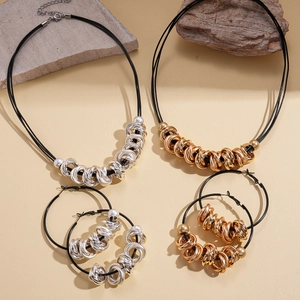 Minimalist layered geometric round pendant necklaces and earrings in gold and silver