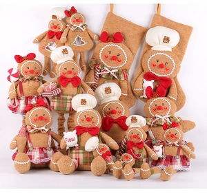 Detailed collection of plush gingerbread man dolls and Christmas stockings with plaid fabric