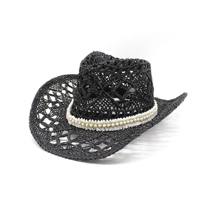 Hollow black straw cowboy hat for women with shell band and upturned brim for summer