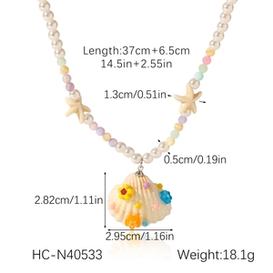 Detail showing dimensions of starfish and shell beaded necklace with length measurements