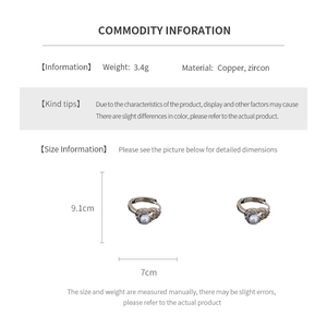 Macro detail of elegant zircon hollow earrings with product dimensions and copper material specs
