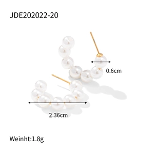 Detail view of pearl C-hoop earrings with 2.36cm length and 1.8g weight specifications