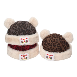 Winter leopard print baby hats with plush fur balls and traditional Chinese lion embroidery