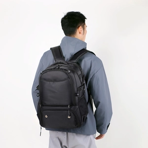 Detailed back view of a black large-capacity basketball backpack with multiple compartments