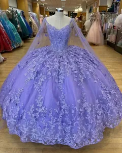 Detailed 3D floral embroidery and butterfly lace on purple layered tulle gown