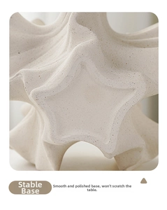Macro detail of star-shaped ceramic base with matte finish and smooth sanded bottom