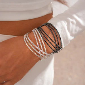 Three-layer geometric crossover cuff bracelet with rhinestones in black and silver finish