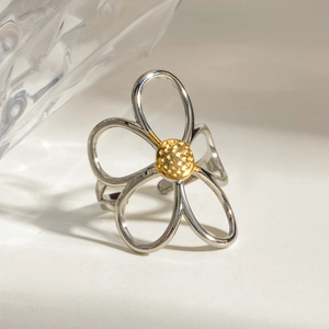 Two-tone cutout flower open ring in gold and silver stainless steel minimalist design