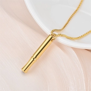 Gold mindfulness breathing necklace pendant for anxiety relief and meditation exercise