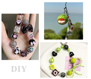 Detail of Christmas candy stripe acrylic beads and DIY keychain charms with bow and dolls