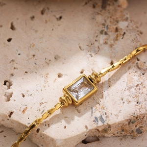 Minimalist 18K gold plated stainless steel necklace featuring a clear square zircon stone