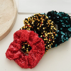 Red gold and green sequin hair scrunchies set for Christmas styling and parties