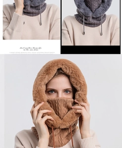 Détail d'une écharpe à capuche d'hiver en tricot avec bordure en fourrure et cordon