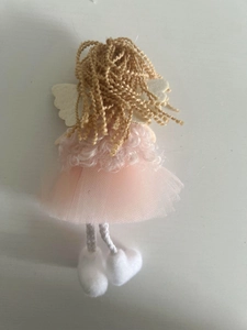 Detail view of pink angel ornament back with mesh skirt and felt wings for tree decoration